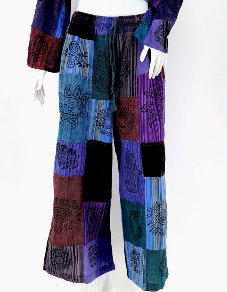 patchwork palazzo pants with sun hamsa design in purple front