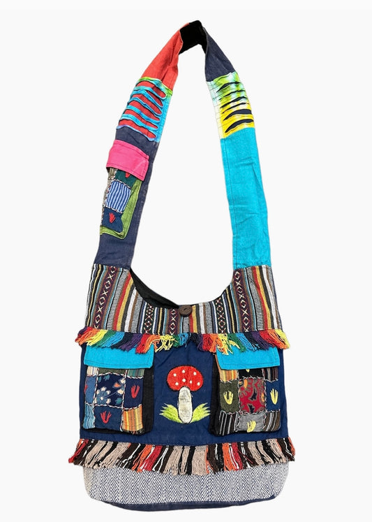 patchwork hobo bag with three pockets and mushroom design