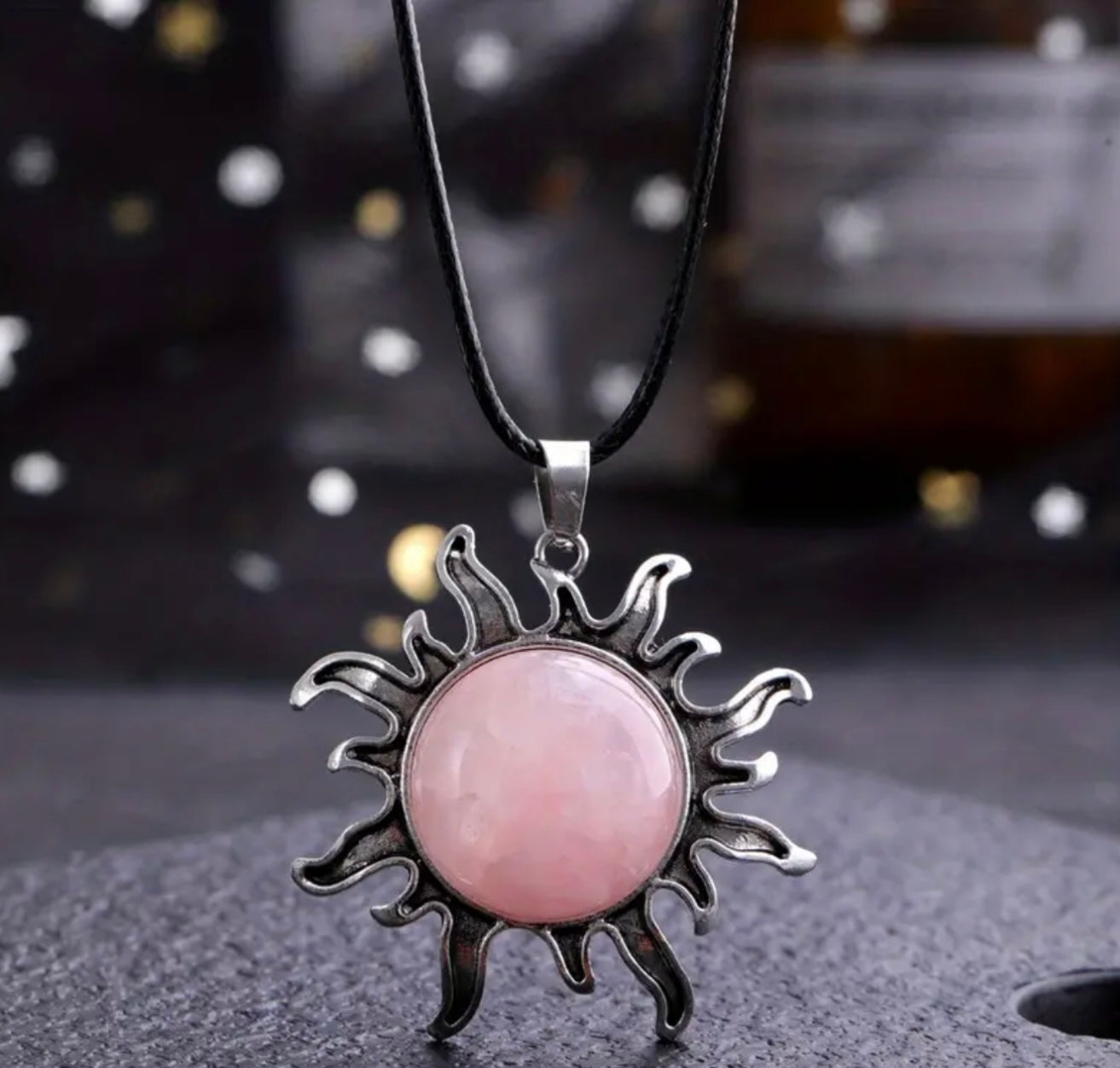 rose quartz sun necklace on black cord