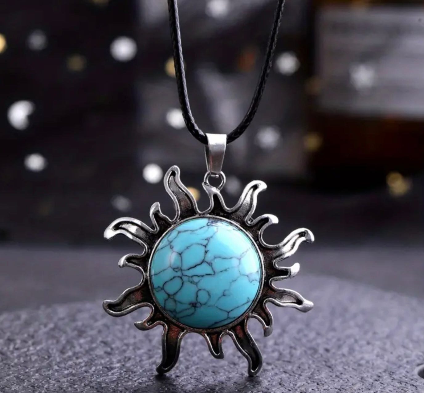 turquoise sun necklace on black cord