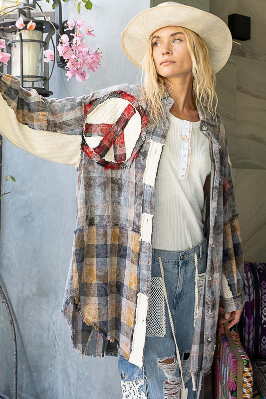 oversized button down plaid hippie shirt with peace signs front view