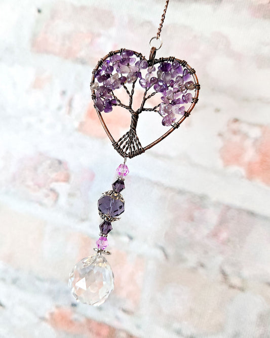 close up of heart tree of life crystal suncatcher with amethyst for boho hippie home décor