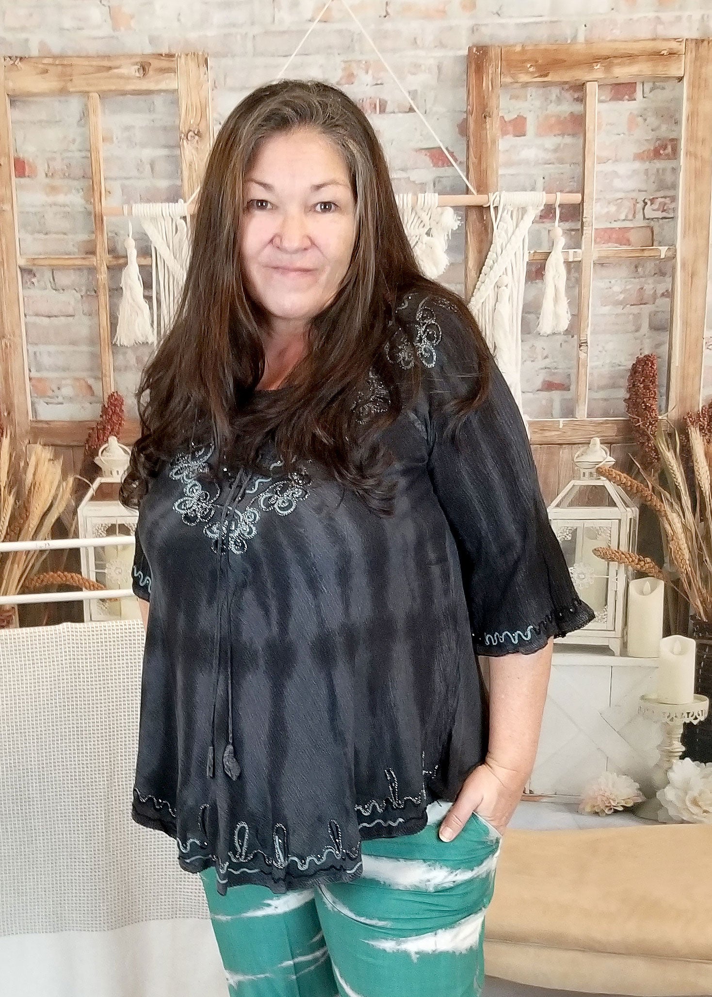 black tie dye top with green and black embroidery and tiny gems front