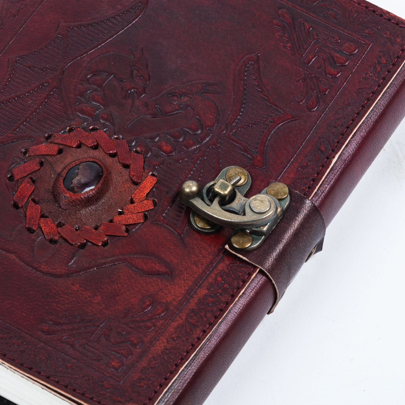 close up of closure on dragon embossed leather journal diary