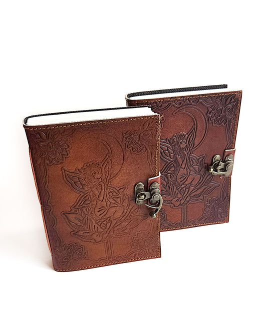 leather journals with embossed fairy moon design and antique buckle closure 