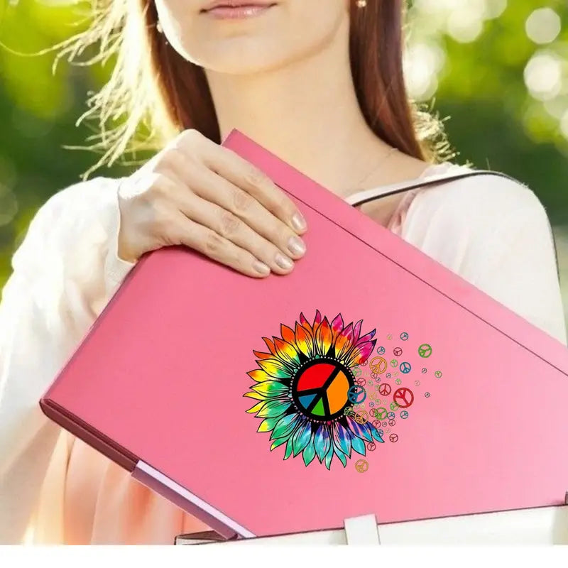 flower peace sign sticker shown on computer