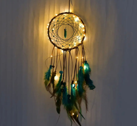 boho dream catcher with lights and dangling stone in center at the boho hippie hut midland michigan
