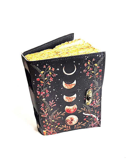 leather journal with moon phases design antique buckle closure and deckle edge vintage look paper top front view