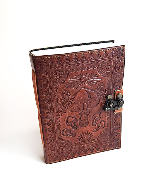 leather journal with embossed mushroom design antique buckle closure front