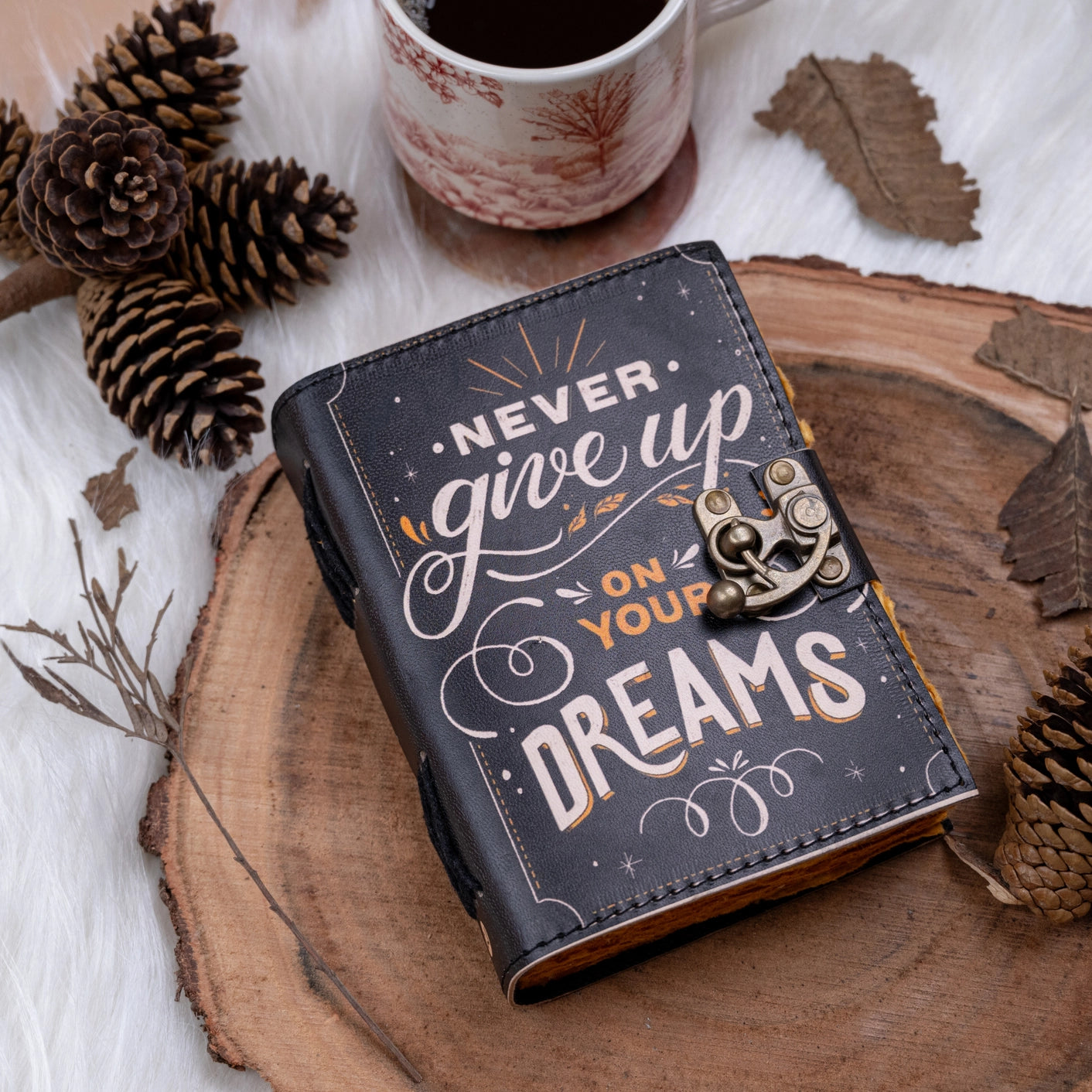 never give up on your dreams leather journal front