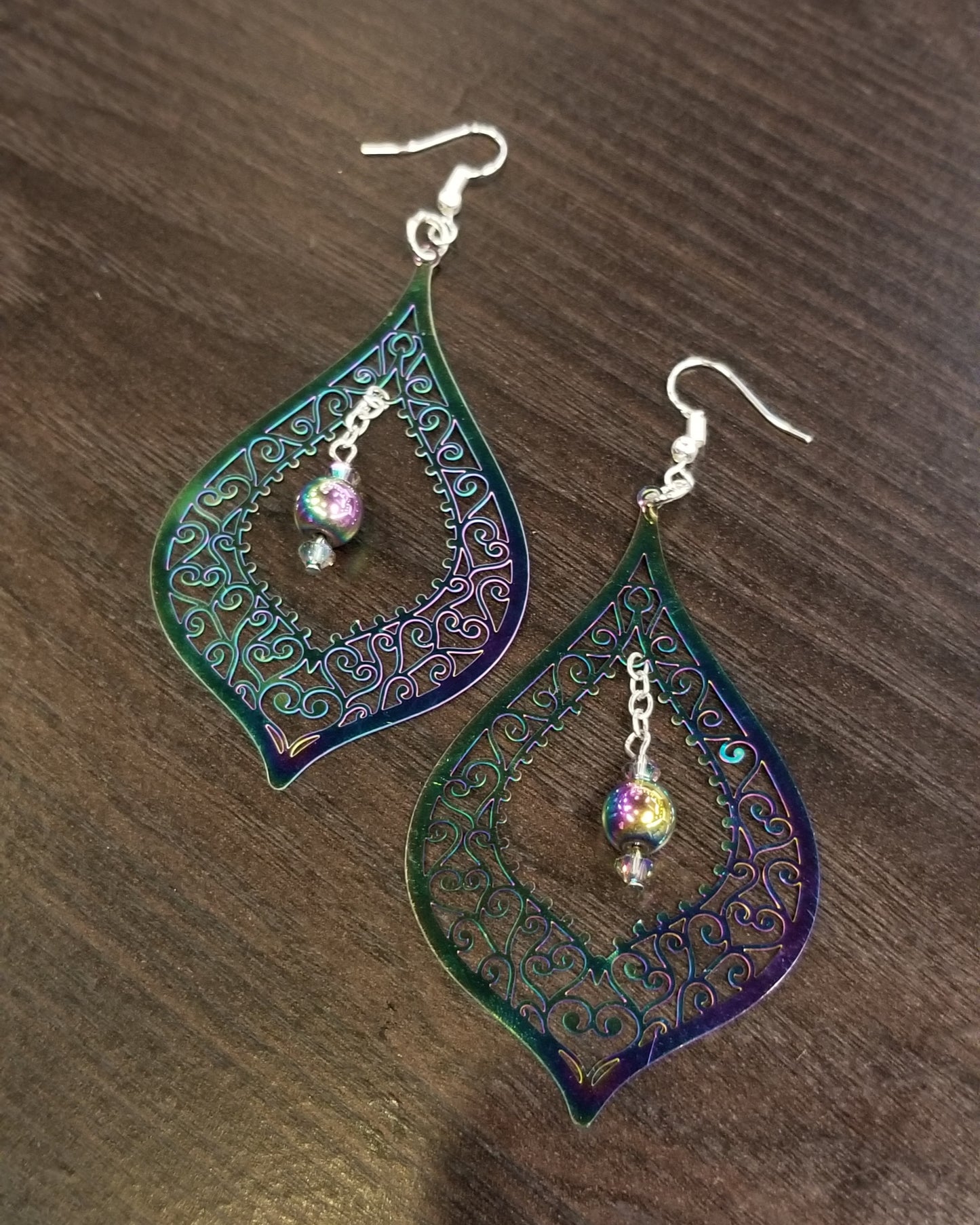 long boho hippie earrings with rainbow hematite beads in center