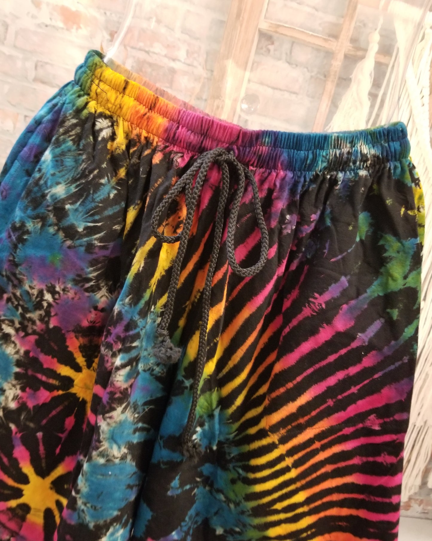 Mens tie dye shorts with drawstring and pockets front