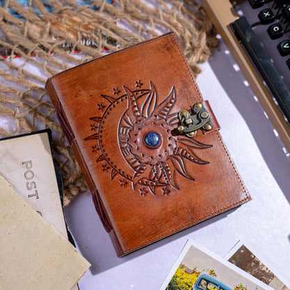 sun embossed leather journal