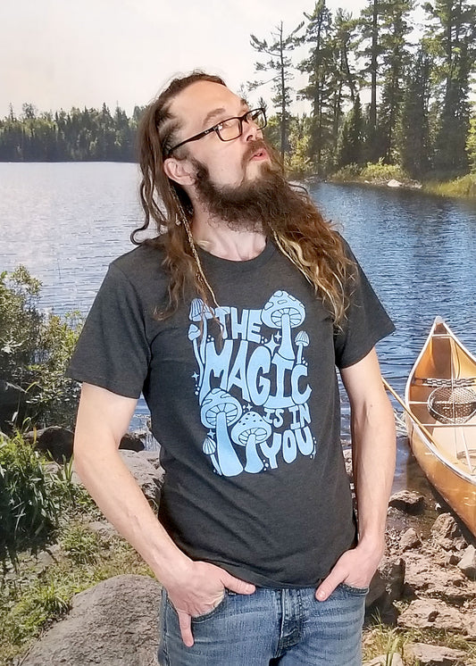 gray mushroom t shirt that says the magic is in you with mushrooms on front