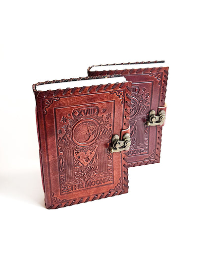 leather journals with embossed the moon tarot card design antique buckle closure and leather stitched edges front