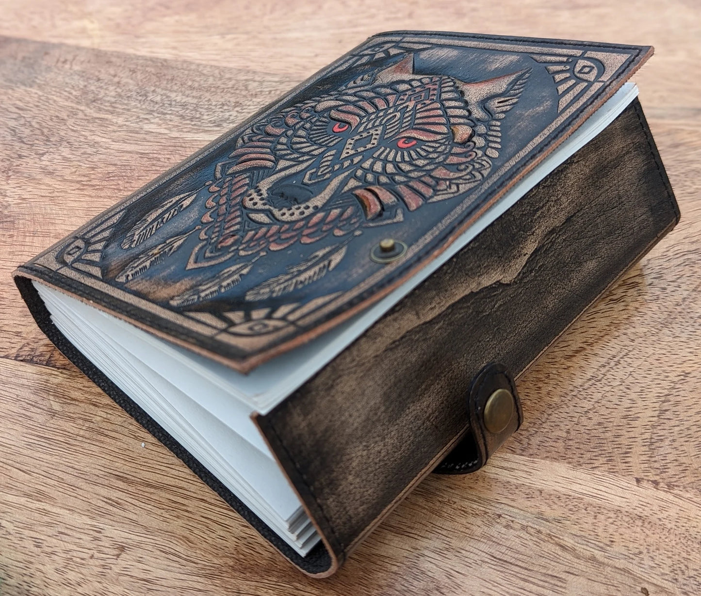 side of wolf embossed leather journal